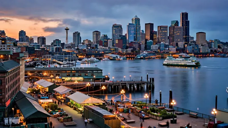 Downtown Seattle skyline and waterfront at dusk showing the best neighbourhoods to stay in Seattle